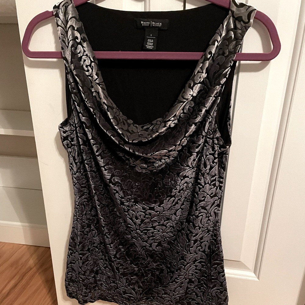 Disignet women sleeveless top by White House Black Market. Like new. Fits size 6